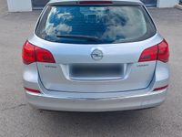 Second-hand Opel Astra 140 CP (102 kW) 2014 Argintiu Break