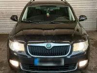 Gebraucht Skoda Superb 140 PS (102 kW) 2012 Schwarz Kombi