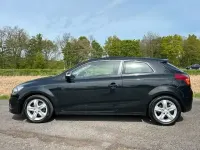 Używany Kia Ceed 125 KM (91 kW) 2011 Czarny Hatchback