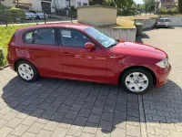 Gebraucht BMW 116 122 PS (89 kW) 2008 Rot Kleinwagen