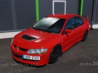 Second-hand Mitsubishi Lancer 265 CP (194 kW) 2004 Roșu Berlinǎ