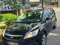 Gebraucht Ford Focus 101 PS (74 kW) 2011 Schwarz Kombi