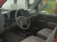 Używany Suzuki Jimny 80 KM (58 kW) 2000 Czerwony SUV