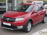 Gebraucht Dacia Sandero Prestige 90 PS (66 kW) 2015 Flammenrot metallic Kleinwagen