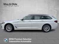 Gebraucht BMW 520 190 PS (139 kW) 2024 Mineralweiss metallic Kombi