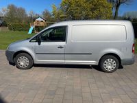 Second-hand VW Caddy Maxi 105 CP (77 kW) 2009 Argintiu Monovolum