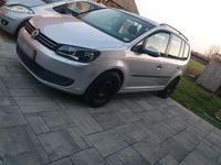 Second-hand VW Touran 105 CP (77 kW) 2011 Argintiu Monovolum