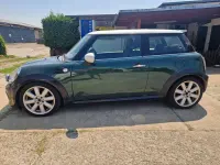 Gebraucht Mini Cooper D 111 PS (81 kW) 2011 British racing green metallic Kleinwagen