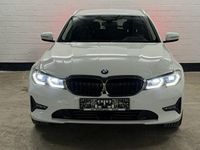 Gebraucht BMW 330e Advantage 184 PS (135 kW) 2021 Weiß Kombi