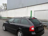 Second-hand Skoda Octavia 105 CP (77 kW) 2012 Negru Break