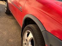 Używany Opel Corsa 44 KM (32 kW) 1996 Czerwony Hatchback