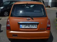 Gebraucht Daihatsu Trevis 58 PS (42 kW) 2006 Papaya perleffekt r44 Kleinwagen