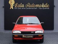 Gebraucht Mazda 323 75 PS (55 kW) 1988 Rot Kleinwagen