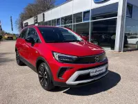 Gebraucht Opel Crossland X 131 PS (96 kW) 2023 Lackierung peperoncino red/metallic klar (metallic) SUV