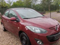 Używany Mazda 2 75 KM (55 kW) 2012 Czerwony Hatchback