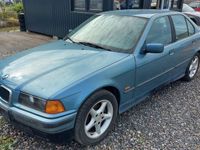 Gebraucht BMW 320 150 PS (110 kW) 1997 Blau Limousine