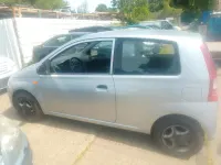 Gebraucht Daihatsu Cuore 60 PS (44 kW) 2004 Grau Kleinwagen