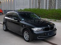 Gebraucht BMW 116 122 PS (89 kW) 2010 Schwarz Kleinwagen