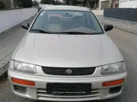 Second-hand Mazda 323 88 CP (64 kW) 1996 Bej Berlinǎ
