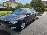 Używany Skoda Superb Elegance 140 KM (102 kW) 2010 Brązowy Kombi