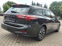 Gebraucht Ford Focus Titanium 125 PS (91 kW) 2023 Obsidianschwarz metallic Kombi