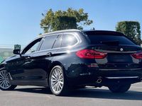 Second-hand BMW 520 Luxury Line 190 CP (139 kW) 2018 Negru Break