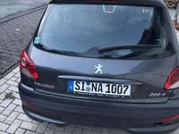 Gebraucht Peugeot 206 Basis 73 PS (53 kW) 2011 Grau Kleinwagen