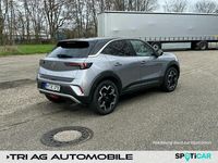 Gebraucht Opel Mokka-e Ultimate 100 kW (136 PS) 2023 Kontrast grau (metallic) SUV