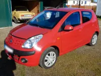 Gebraucht Nissan Pixo 68 PS (50 kW) 2009 Rot Kleinwagen