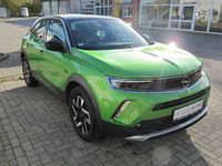 Gebraucht Opel Mokka Elegance 131 PS (96 kW) 2021 Matcha green/ikone gruen SUV