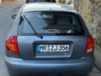Używany Kia Rio 98 KM (72 kW) 2001 Szary Hatchback