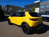 Gebraucht Kia Stonic Platinum Edition 120 PS (88 kW) 2019 (bmy) floridagelb met./schwarz (metallic) SUV