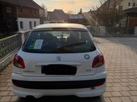 Gebraucht Peugeot 206+ 75 PS (55 kW) 2010 Weiß Kleinwagen