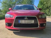 Gebraucht Mitsubishi Lancer 143 PS (105 kW) 2010 Rot Limousine