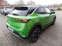 Gebraucht Opel Mokka-e Ultimate 100 kW (136 PS) 2021 Matcha green/ikone gruen SUV