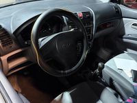 Second-hand Kia Picanto 65 CP (47 kW) 2006 Portocaliu Hatchback