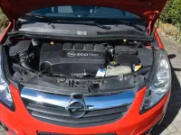 Usado Opel Corsa Innovation 90 HP (66 kW) 2009 Vermelho Citadino