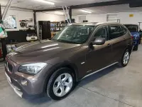 Gebraucht BMW X1 143 PS (105 kW) 2012 Sparkling bronze metallic SUV