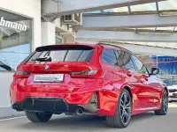 Gebraucht BMW 320 M Sport 190 PS (139 kW) 2024 Melbourne rot (metallic) Kombi