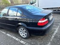 Second-hand BMW 318 143 CP (105 kW) 2004 Negru Berlinǎ