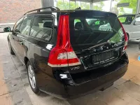 Używany Volvo V70 150 KM (110 kW) 2015 Czarny Kombi
