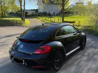 Gebraucht VW Beetle Exclusive 105 PS (77 kW) 2013 Schwarz Kleinwagen