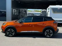 Gebraucht Peugeot e-2008 GT 100 kW (136 PS) 2022 Orange SUV