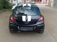 Używany Opel Corsa Edition 87 KM (63 kW) 2011 Czarny Hatchback
