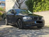 Second-hand BMW 116 122 CP (89 kW) 2010 Negru Hatchback