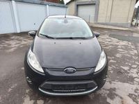 Gebraucht Ford Fiesta Titanium 95 PS (69 kW) 2011 Pantherschwarz metallic Kleinwagen