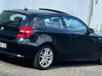 Gebraucht BMW 116 122 PS (89 kW) 2009 Schwarz Kleinwagen