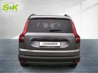 Gebraucht Dacia Jogger Extreme 141 PS (103 kW) 2025 Dolomitgrau (grau) Van / Kleinbus