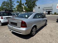Second-hand Opel Astra 125 CP (91 kW) 2004 Argintiu Coupe