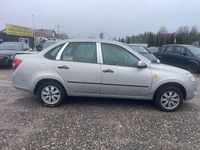 Second-hand Lada Granta 87 CP (63 kW) 2014 Argintiu Berlinǎ